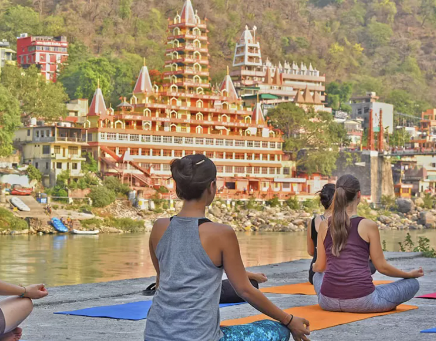 Yoga and meditation sessions in Rishikesh amidst peaceful Himalayan landscapes
